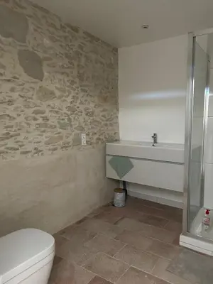 a bathroom with a toilet and a sink at Soupex Castle century XII in Soupex