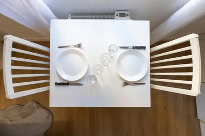 a bathroom with two toilets in a room at 2 appartements cosys en plein cœur de Varilhes in Varilhes