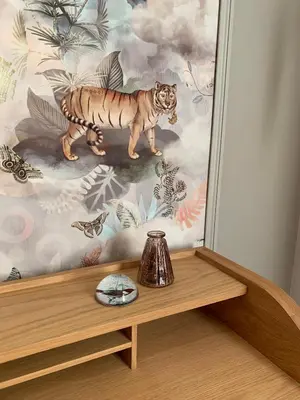 a mural of a tiger on a wall in a room at Domaine de Grave in Mirepoix