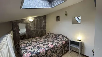 a small bedroom with a bed and a window at Pavillon avec grande terrasse à l'abri des regard, piscine, clim - GN020-008 in Gruissan