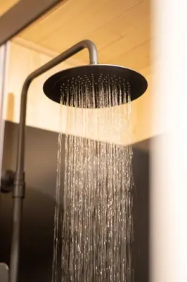 a shower with water coming out of it at Homnest - Brumes des Hauts Bains - Coeur Pyrennees in Escouloubre