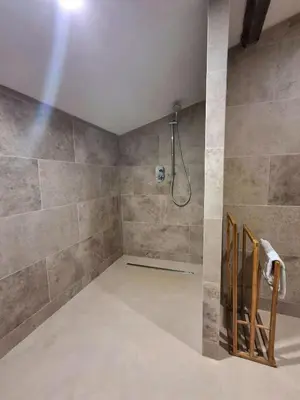 a bathroom with a shower with tiled walls at Mediterranean Haven In Pine Forest At Leucate in Roquefort-des-Corbières