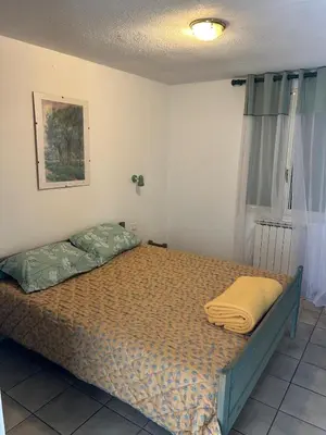a bedroom with a bed in a room at Nature stay, French Villa in Villarzel-du-Razès