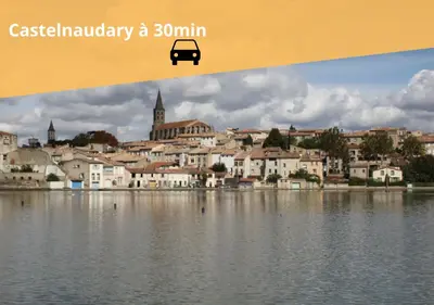a large building with a bus in front of it at Cap color-Parking public gratuit-4 guests-centre-ville in Limoux