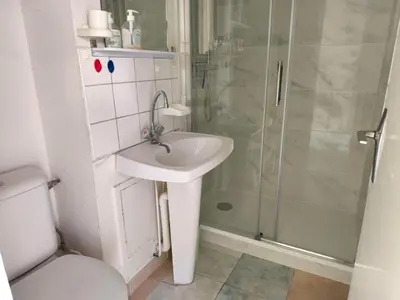 a bathroom with a sink and a shower at Appartement T2 à Gruissan - Piscine & Parking, 2/3 Pers. - FR-1-796-107 in Gruissan