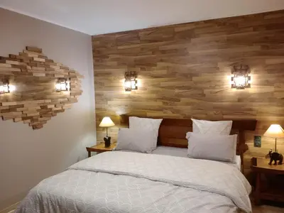 a refrigerator filled with food and a plate of food at chambre et table d'hôtes Au coin de la cité 2 in Carcassonne