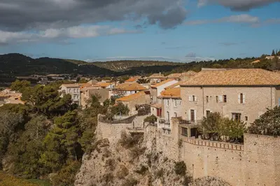 a group of buildings on top of a mountain at Les Figuiers de Tamaroque in Portel-des-Corbières
