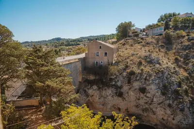 a house on the side of a mountain at Le Tamaroque in Portel-des-Corbières