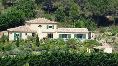 a house in the middle of a garden at Villa Lana in Verzeille