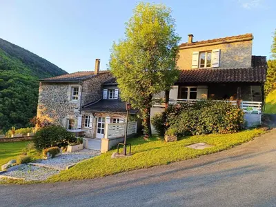 a house on the side of a road at Maison de vacances, gîte au calme en pleine nature, le Frêne in Lacrouzette