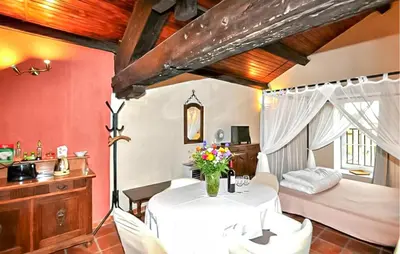 a kitchen with a washer and dryer in it at Maison Piscine Proche Mer in Portel-des-Corbières