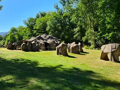a group of tents and elephants in a field at Mobil-home à Pamiers, 4 Pers, 2 Ch, Terrasse - API-1-52-1950 in Pamiers