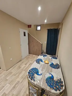 a kitchen with a white refrigerator and a sink at modern studio ground floor Wi-Fi TV parking in Salses-le-Chateau