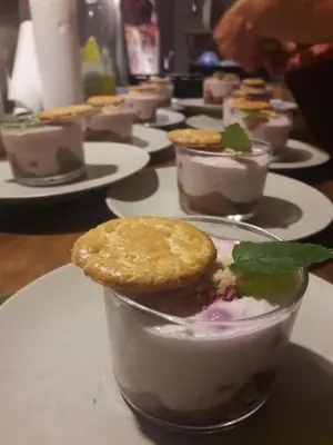 a table topped with plates of desserts on plates at Le Castillou in Luc-sur-Aude