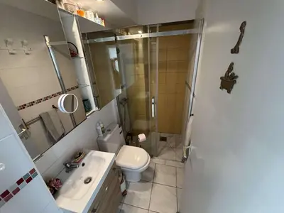 a bathroom with a shower and a toilet and a sink at Appt 2 pièces 4 couchages PORT LA NOUVELLE PN730-007 in Port-la-Nouvelle