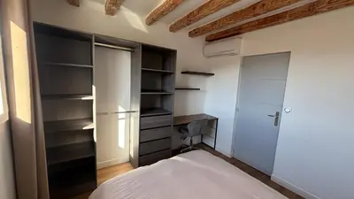 a bedroom with a bed and a closet at Maison standing 5 chambres Jardin et Garage in Aussillon