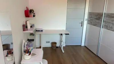 a small bedroom with a bed with two night stands at Maison standing 5 chambres Jardin et Garage in Aussillon