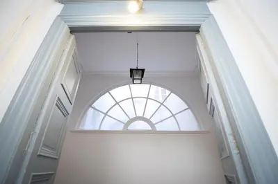 a hallway with a window in a building at Aviator in Carcassonne