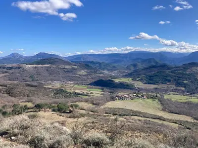 a view of the mountains from the top at Au pied du plateau in Campagne-sur-Aude