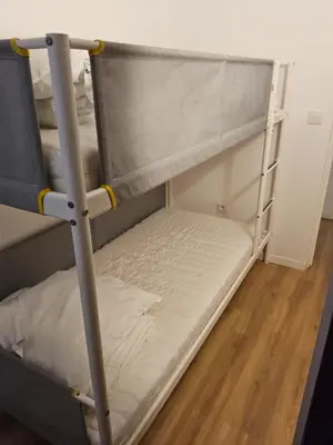 a bunk bed in a room with a wooden floor at Barracuda of port terrace sea for 6 in Port-la-Nouvelle