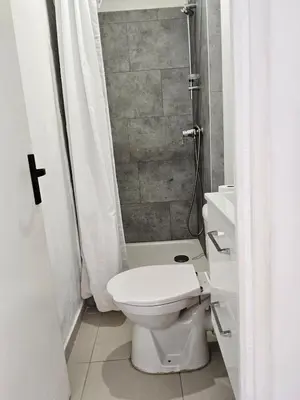 a bathroom with a toilet and a shower at Barracuda of port terrace sea for 6 in Port-la-Nouvelle