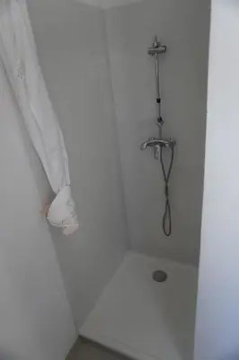 a bathroom with a shower with a faucet at Big 8 at Beach Clim Mer Terrace for 6 in Port-la-Nouvelle