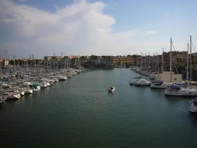 a group of boats docked in a marina at Studio cabine – 2 couchages – Vue port – Résidence Le Chébeck – Gruissan in Gruissan