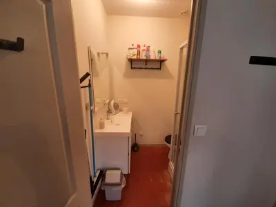 a small bathroom with a sink and a toilet at Studio Narbonne in Narbonne