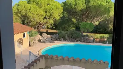 a large blue swimming pool in a yard at Villa avec piscine, jardin de 8000m2, cuisine extérieur à 20min de Carcassonne in Arzens
