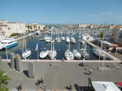 a marina filled with lots of boats in the water at Villa confortable, parking, animaux OK - 6 pers. - FR-1-796-109 in Gruissan