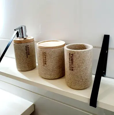 three cups sitting on a shelf at La Caponnière in Carcassonne