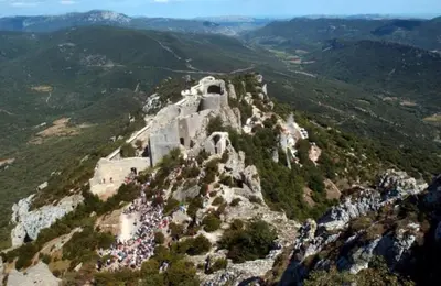 a group of people standing on top of a mountain at La Claouzo in Duilhac