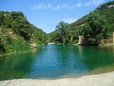 a river in the middle of a mountain at Etape Cathare in Duilhac