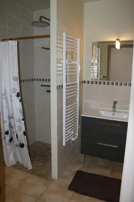 a bathroom with a sink and a shower at Etape Cathare in Duilhac