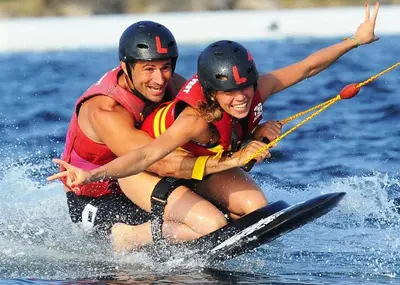 a man and a woman on water skis in the water at Chouette coquette in Salses-le-Chateau