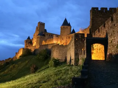a castle sitting on top of a hill at B&B Coup de Coeur in Bram