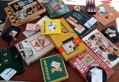 a bunch of books sitting on top of a table at Petite Chouette in Salses-le-Chateau