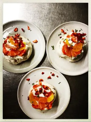 three plates of food on a table at Mas Lluganas in Mosset