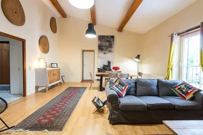 a living room with a couch and a table at Domaine Calmel & Joseph in Montirat