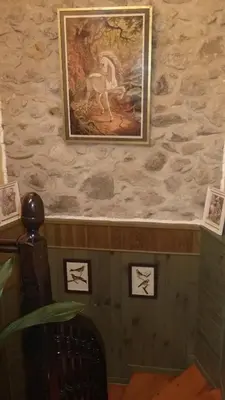 a wall with a painting of a horse on it at L'Envolée in Belvianes-et-Cavirac