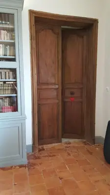 a bathroom with a white sink and a mirror at Château Moussoulens in Moussoulens