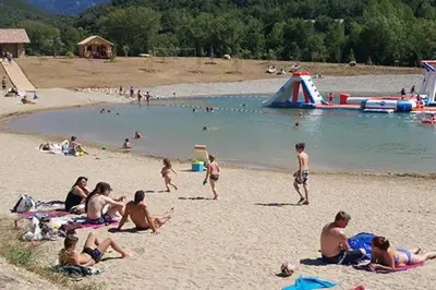 a group of people sitting on a beach at Gîte les Hirondelles in Caudiès-de-Fenouillèdes