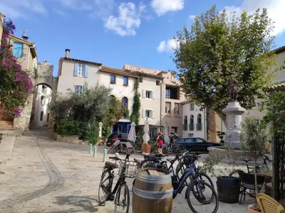 a group of bikes parked in a street with buildings at Fisherman's View in Bages