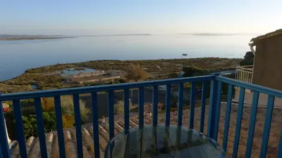 a view of the water from the balcony of a house at Fisherman's View in Bages