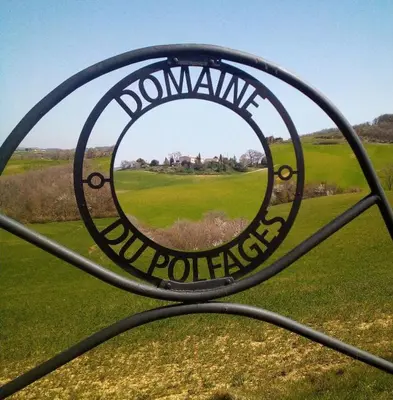 a sign that says doomsday on a metal gate at Jj French Gites in Pécharic-et-le-Py
