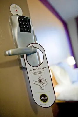 a key chain attached to a remote control at B&B HOTEL Narbonne 1 in Narbonne