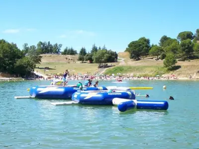a group of blue tubes in the water at Nina in Carcassonne