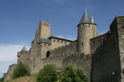 a castle with two towers on top of a hill at Cammas de Bas in Montréal