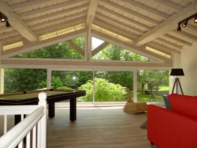 a pool table in a living room with a wooden ceiling at Le Moulin de l'Abbé in Sorèze