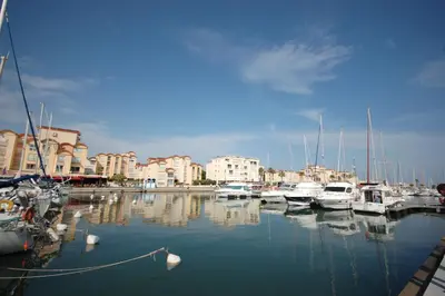 a bunch of boats are docked in a marina at Studio Moderne - Plage du Grazel in Gruissan